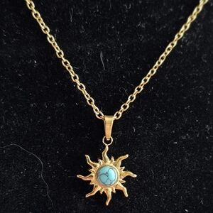 Gold Sun Pendant Necklace with Turquoise Accent